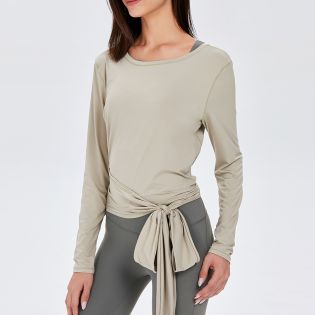 Comfortable round neck, sexy lace-up design, long-sleeve yoga jacket with V-back.